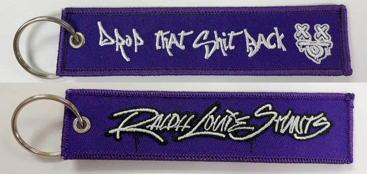 “Drop That Shit Back” Jet Tag / Keychain Purple Embroidered Tag